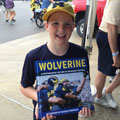 Breandon Roscoe with University of Michigan football gift picture book WOLVERINE: A Photographic History of Michigan Football, Vol. 1
