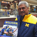 Jim Betts with University of Michigan football gift picture book WOLVERINE: A Photographic History of Michigan Football, Vol. 1