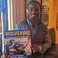 Vincent Smith with University of Michigan football gift picture book WOLVERINE: A Photographic History of Michigan Football, Vol. 1